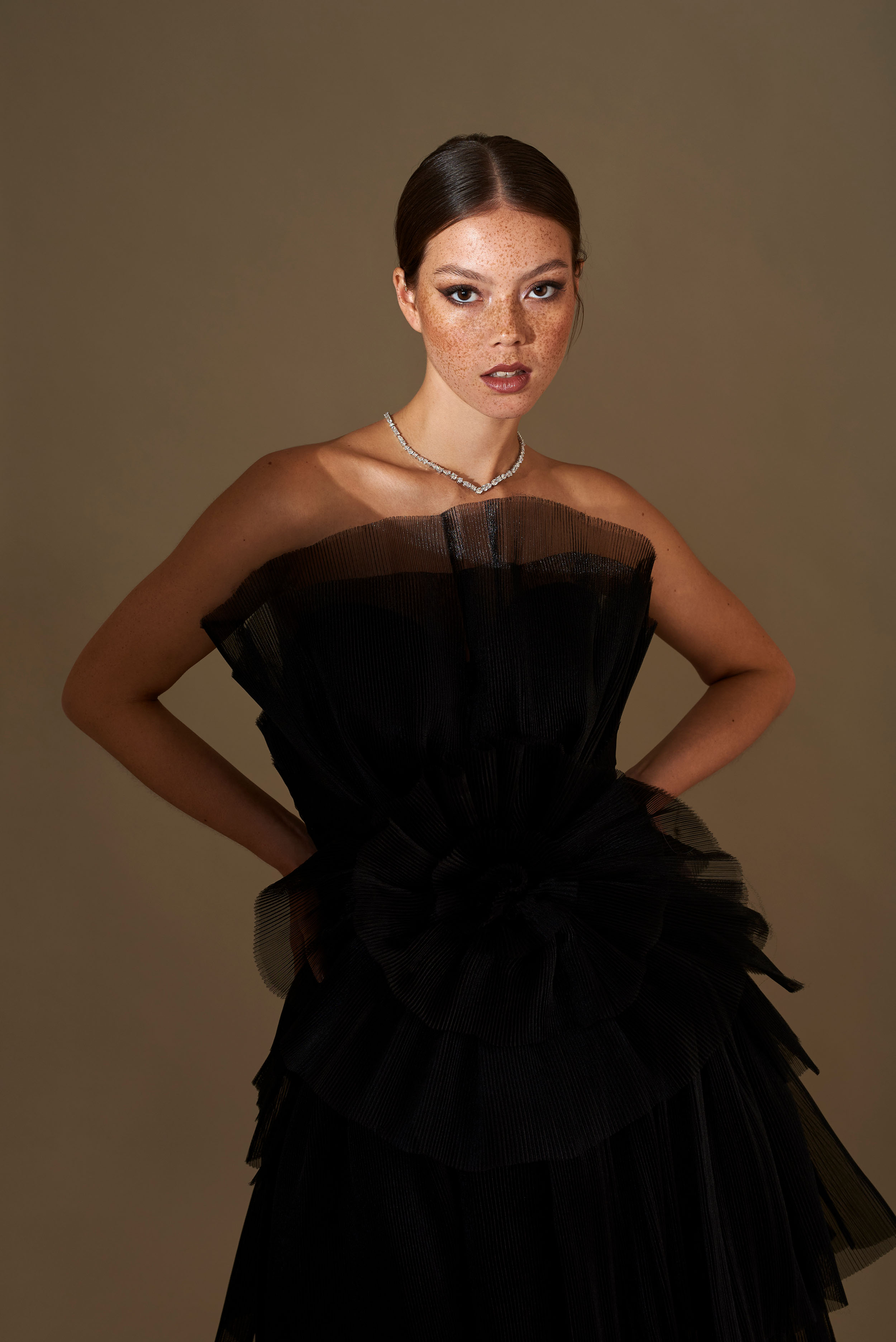 Editorial photography for Romy Daniels - model with dramatic lighting and moody atmosphere